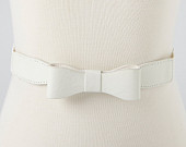 white bow belt